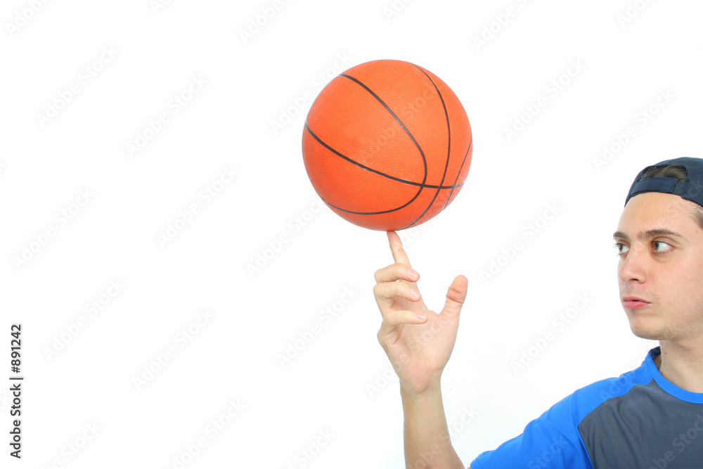 young man playing basketball isolated