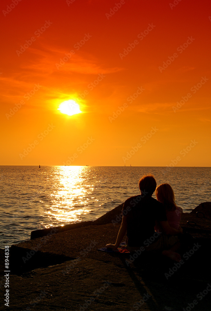 a couple waiting for the sunset