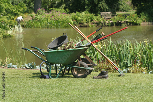 gardening tools by pond