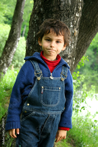 the boy in a forest. © irina2005