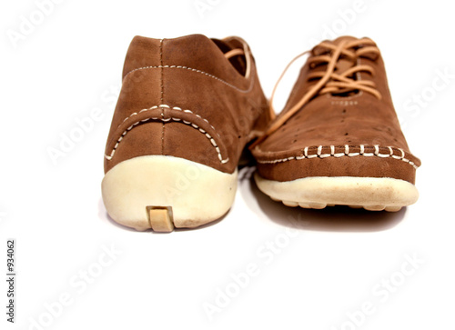 a pair of brown shoes.isolated on white