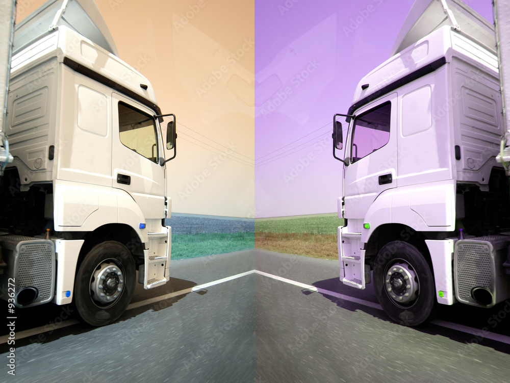 two white trucks on the road