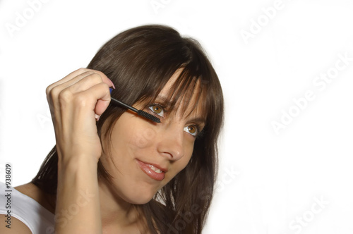 woman putting on make-up #2