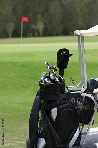 golf clubs on cart