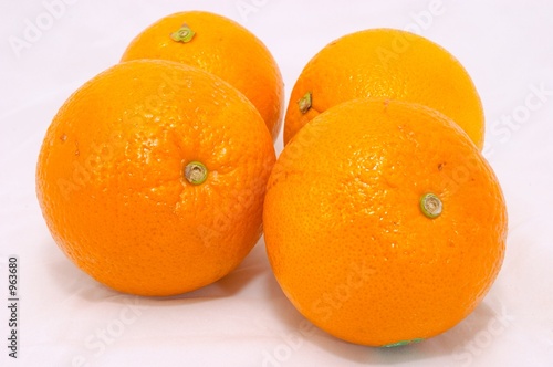 four orange fruit photo