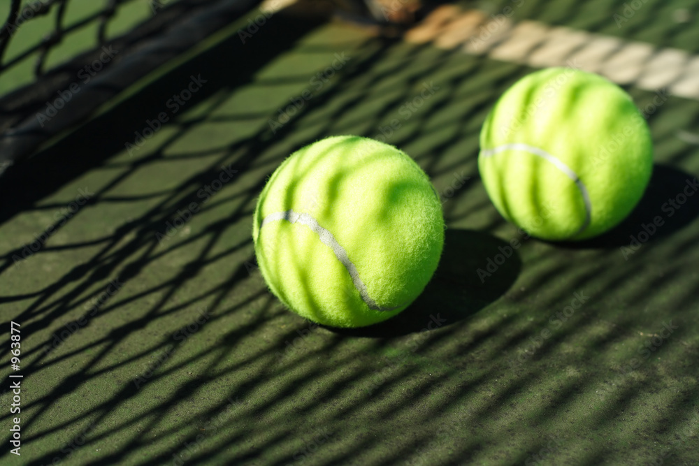 tennis balls in court