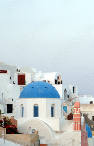 houses and church on cliff