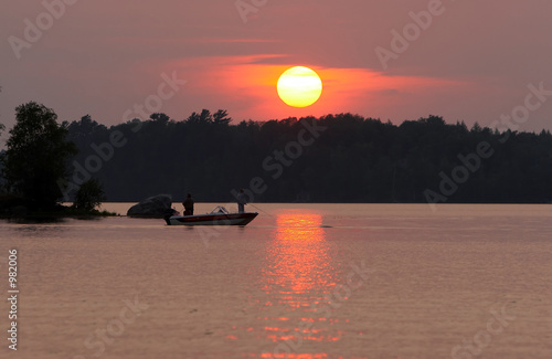 fishermen at sunset