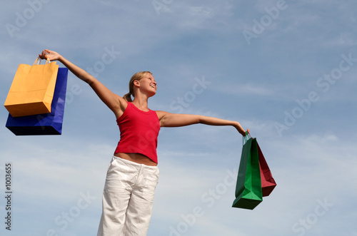 happy woman with shopping bags