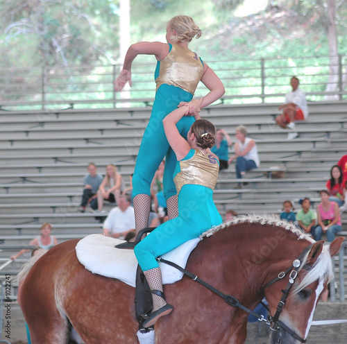 horse vaulter team performing