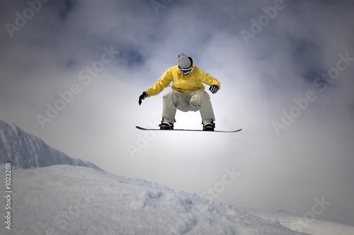 snowboarder jumping high in the air