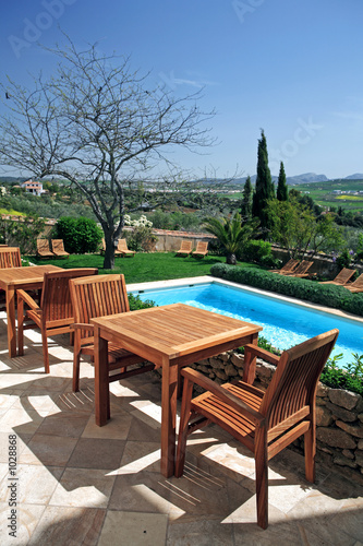 luxury rustic hotel and swimming pool in countryside