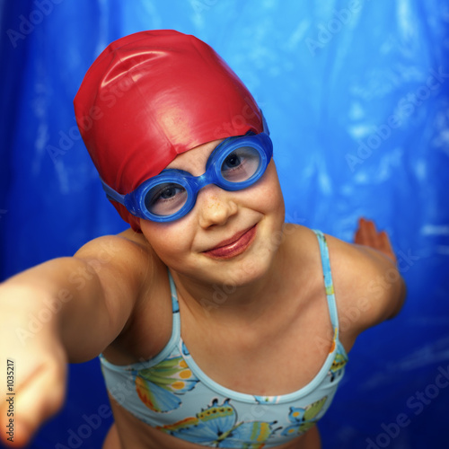 portrait of a girl in  swimming pool