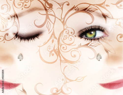 woman’s face with a diamond and scrolls