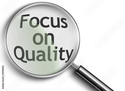 magnifying glass with focus on quality