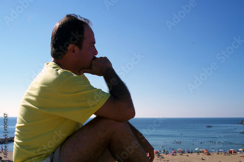 man thinking over the beach © timur1970