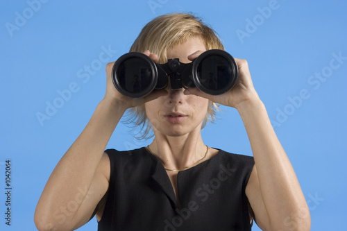 businesswoman with  binoculars