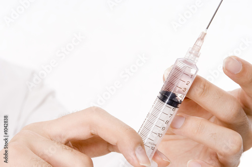 hands and syringe
