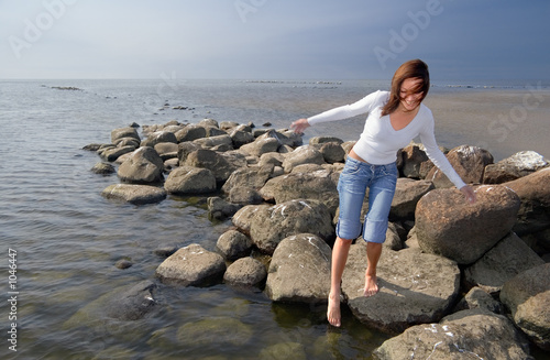 girl touching the water