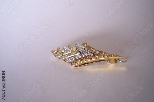 golden brooch with diamonds
