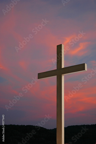 wooden cross and sunset