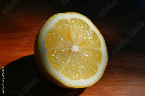 lemon on cutting board
