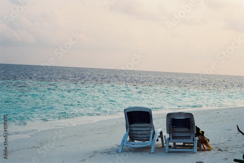  two deck chairs at maldives