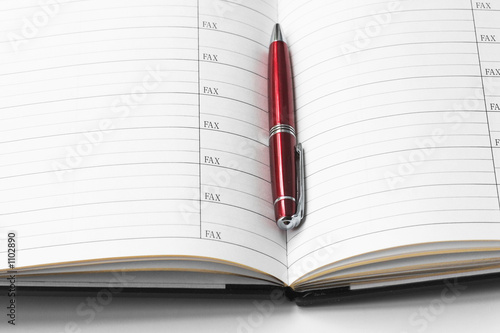 address book and a pen