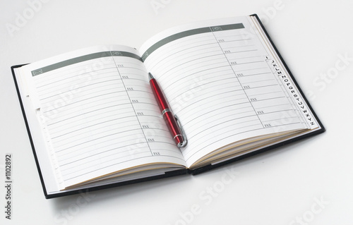 address book and a pen
