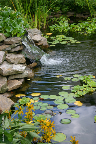 small man made pond and waterfall