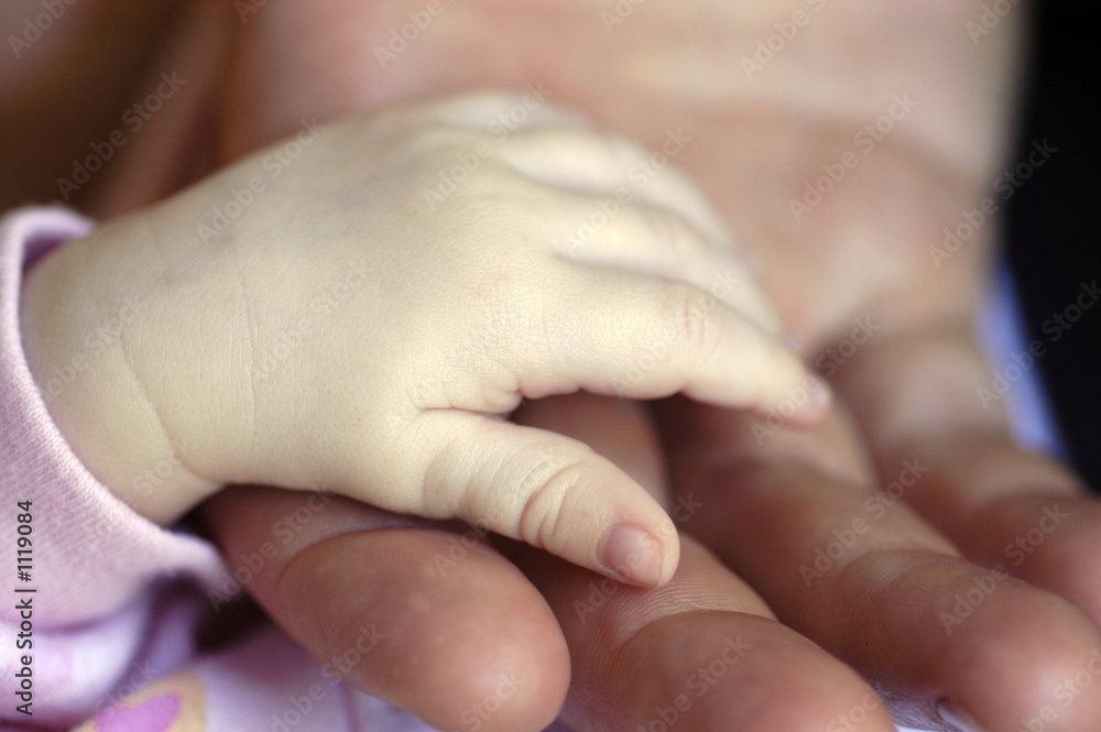 father and baby hand