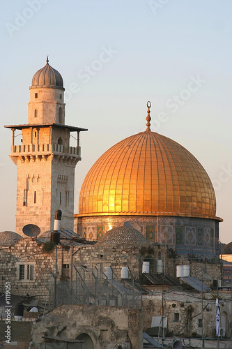 the dome of the rock at sunset