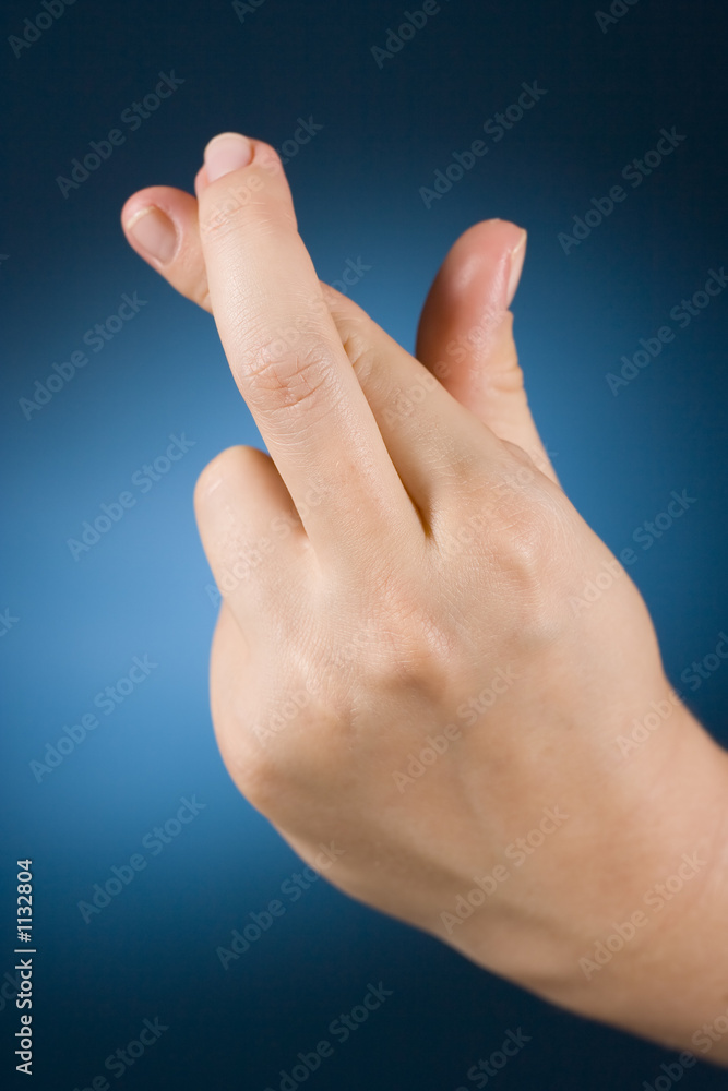 Fototapeta premium hand with crossed fingers
