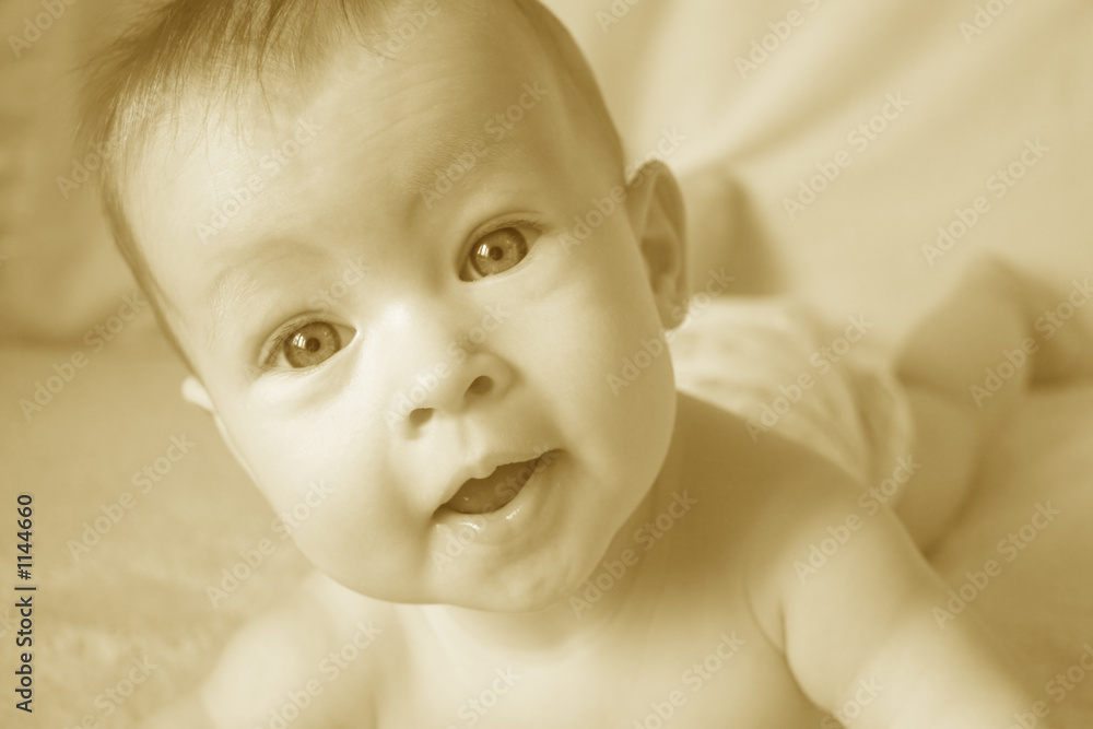 baby closeup in yellow baby closeup in yellow