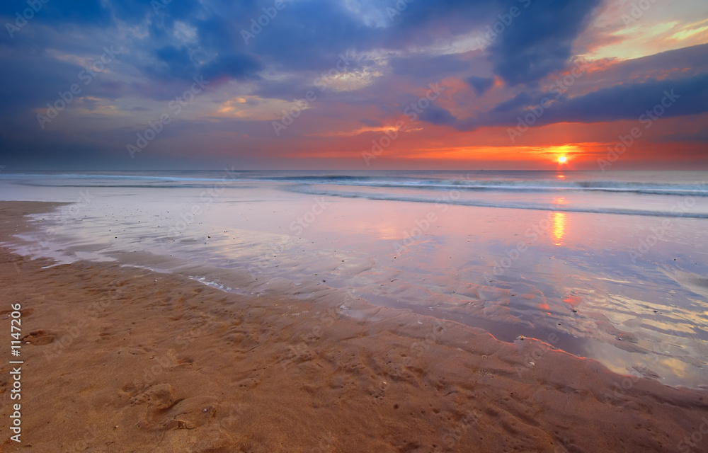 Naklejka premium sunset on the beach