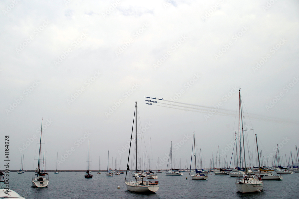 sailboats with plane formation