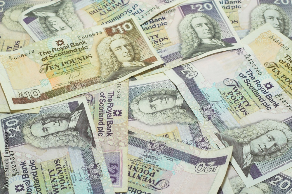 ten and twenty pounds notes as a background ten and twenty pounds notes as a background