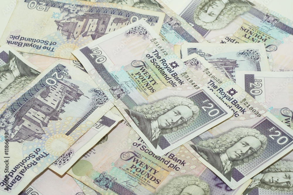 ten and twenty pounds notes as a background ten and twenty pounds notes as a background