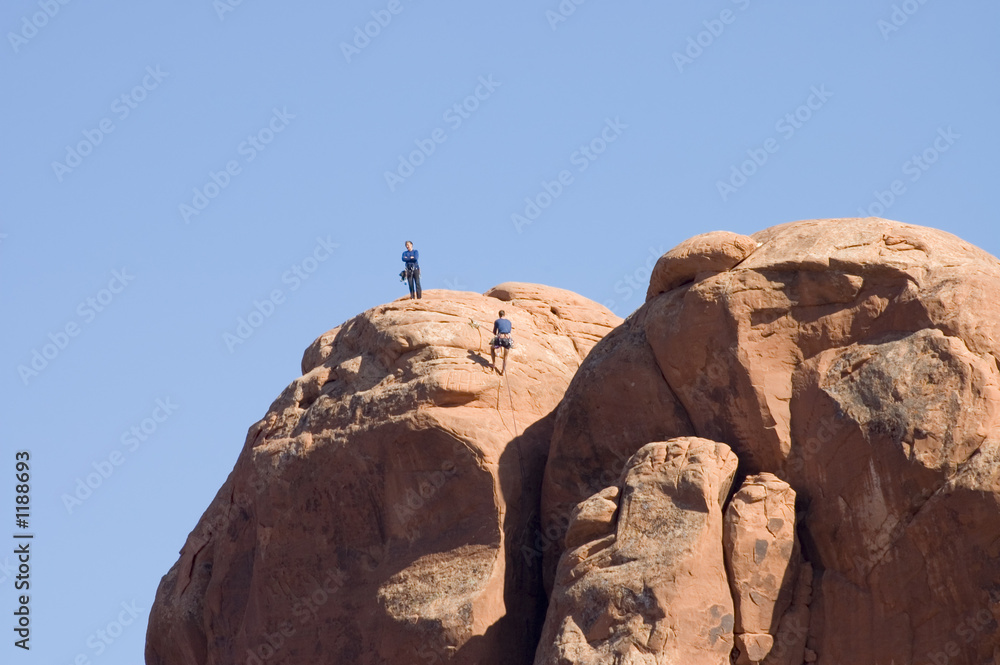 rock climbers in Arches National park , Utah