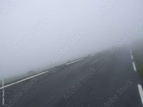Fototapeta road in bad, foggy weather