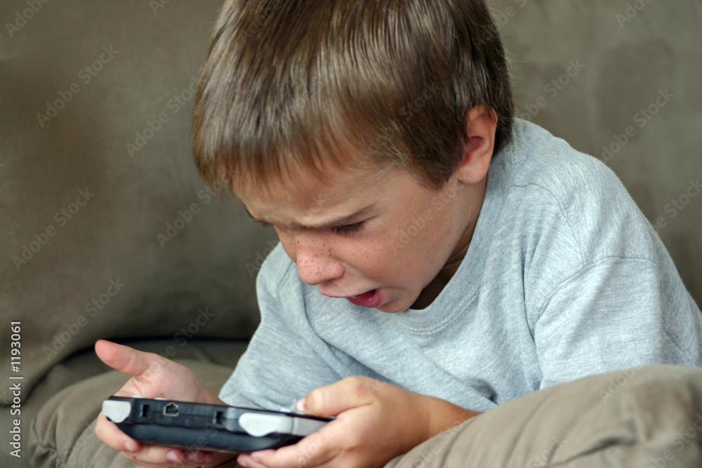 boy playing game boy playing game