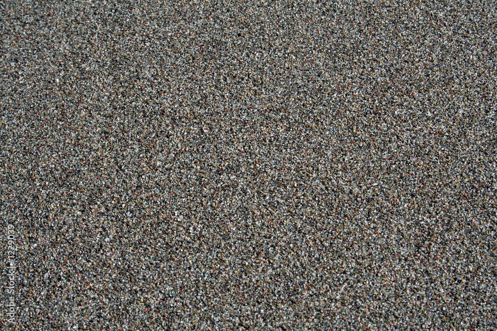 black sand on the beach black sand on the beach