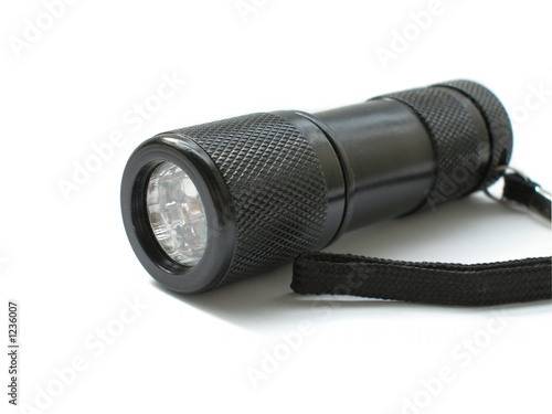 metallic electric torch isolated on a white backgr