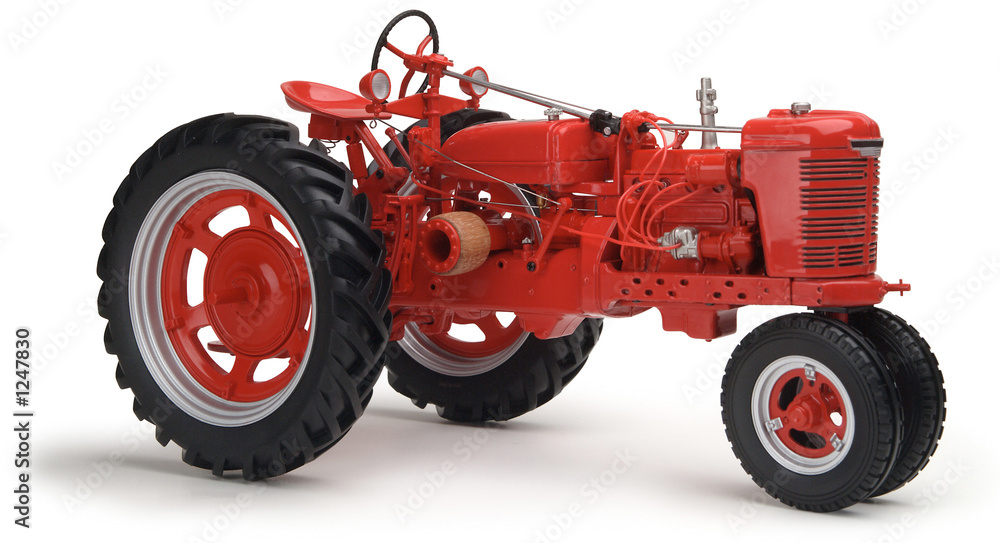 Obraz premium red tractor on white background