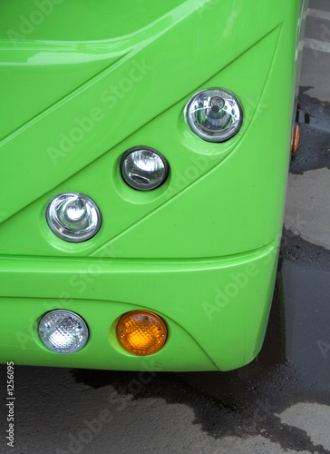 green bus headlight