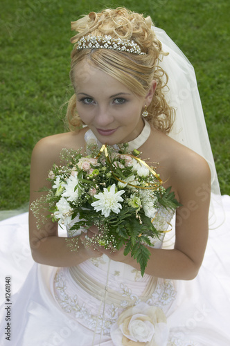 the beautiful bride with a bouquet of flowers.