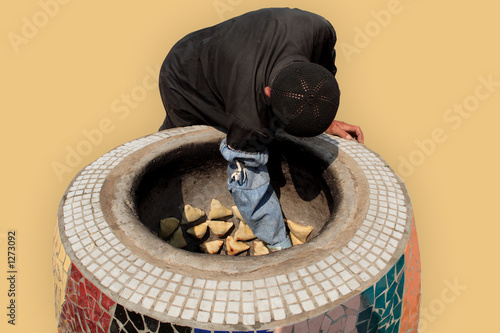 the traditional way of cooking samsa