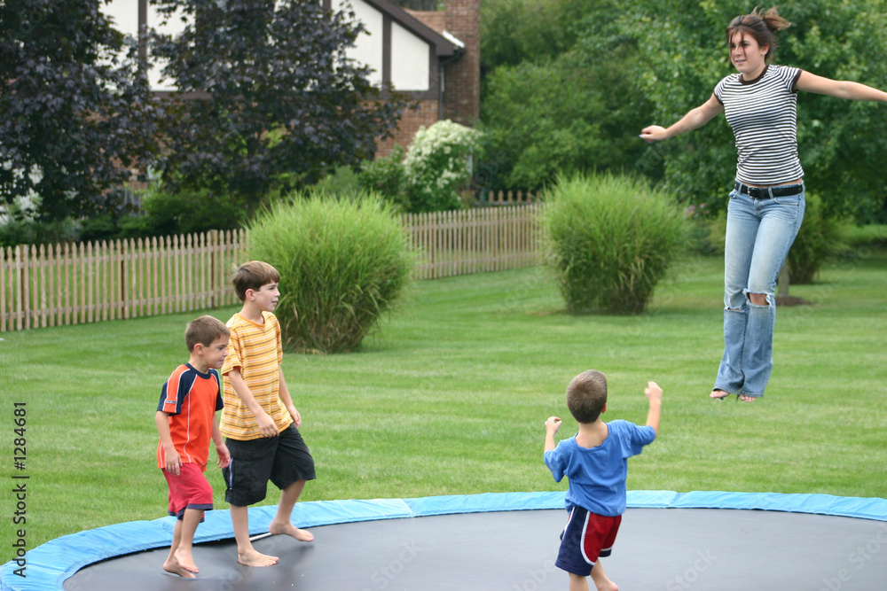 Obraz premium family on trampoline