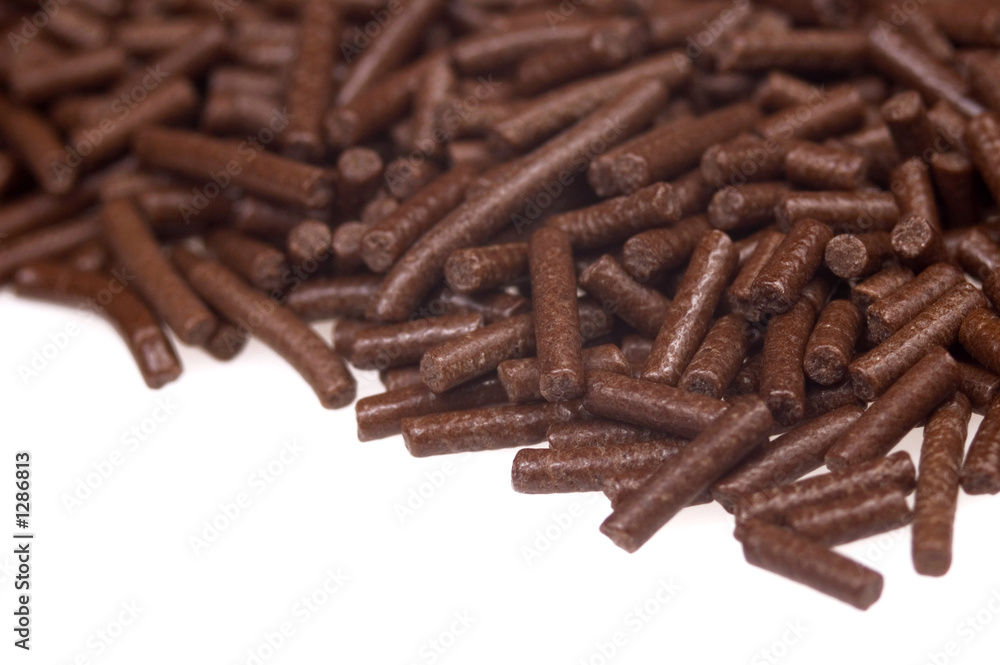 chocolate sprinkles on white background chocolate sprinkles on white background