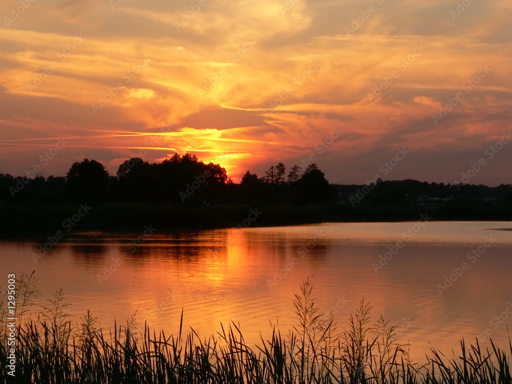 red sunset by the lake